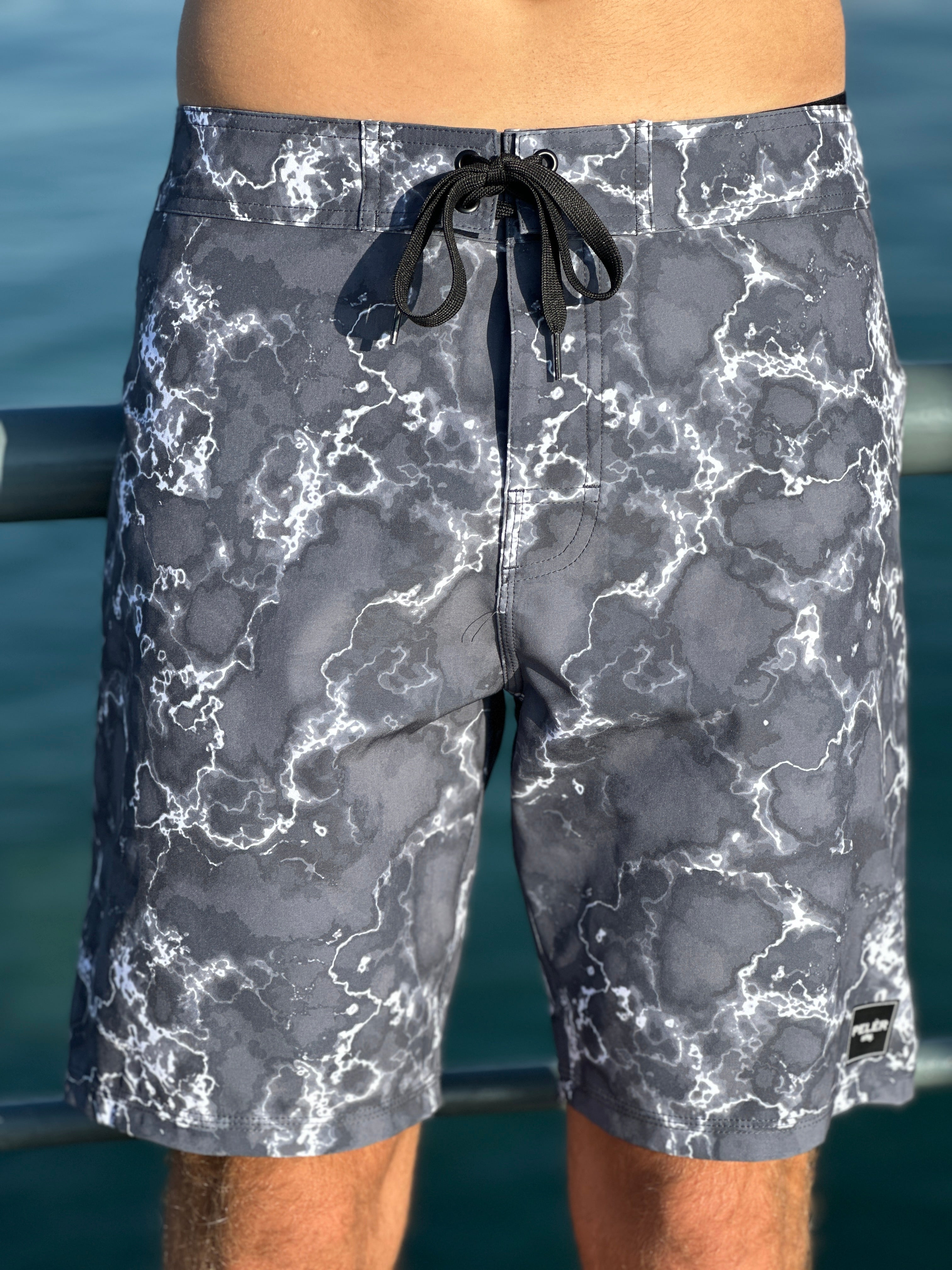 Pantaloncini da surf luminosi Peler srfng. Aminian Menegatti GbR